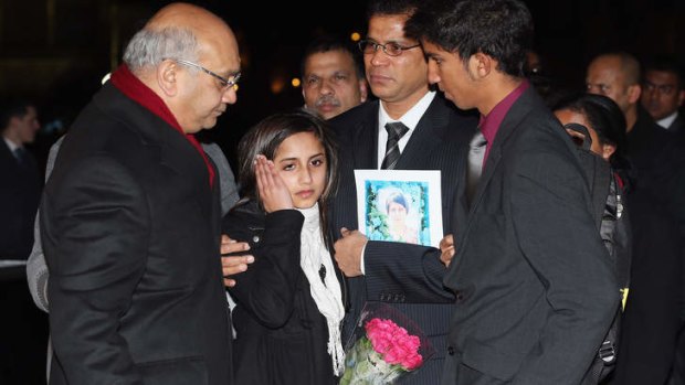 British MP Keith Vaz (left) speaks with the daughter Lisha, husband Ben Barboza and son Junal of nurse Jacinta Saldanha, as they arrive at the Houses of Parliament in London, December 2012.