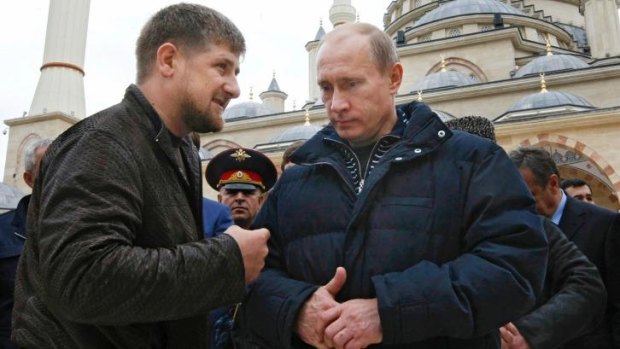 Allies: Russian Prime Minister Vladimir Putin, right, listens to Chechen President Ramzan Kadyrov in Grozny, Chechnya.
