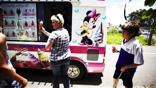 Helping hand ... communities such as Grantham West, which received free ice-cream for children from vendor Toby's kiosk, are benefiting from company support.