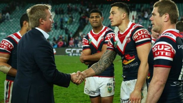 Job done: Trent Robinson shakes hands with Sonny Bill Williams after the win against the Rabbitohs in Round 26.