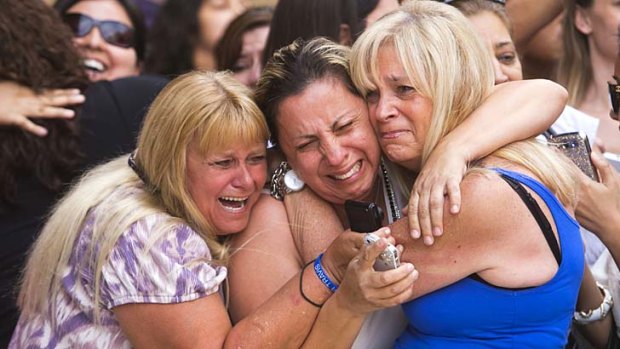Pleased with the decision: From left, Kathy Brown, of Paradise Valley, Virginia Aguiar, of Scottsdale, Jane Crook, of Scottsdale, react to the guilty verdict for Jodi Arias.