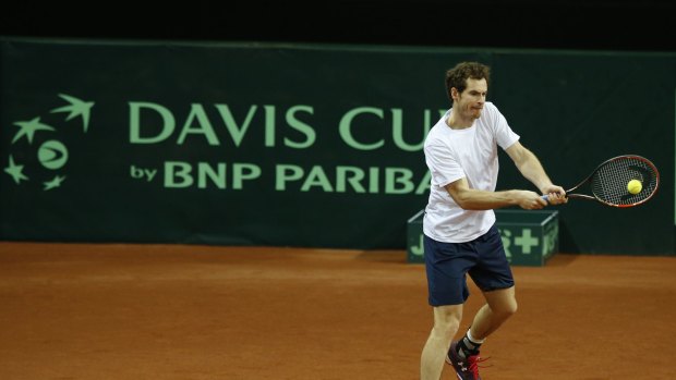 Britain's Andy Murray hits a return during a practice session for the Davis Cup final in Ghent, Belgium.