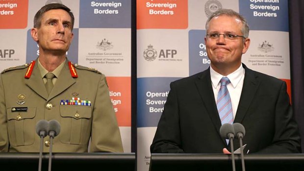 Staying tight lipped over the incursions: Lieutenant-General Angus Campbell, left, and the Immigration Minister Scott Morrison.