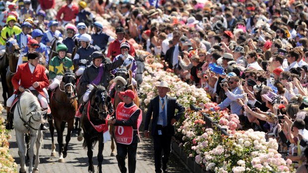 Damien Oliver returns to scale on 2013 Melbourne Cup champion Fiorente.