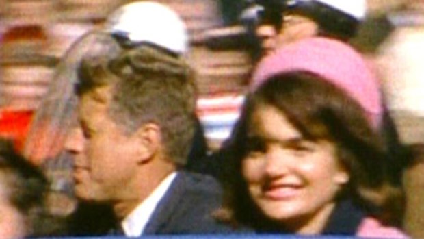 President John F. Kennedy and Jacqueline Kennedy riding in the motorcade in Dallas moments before the fatal shot was fired on November 22, 1963.