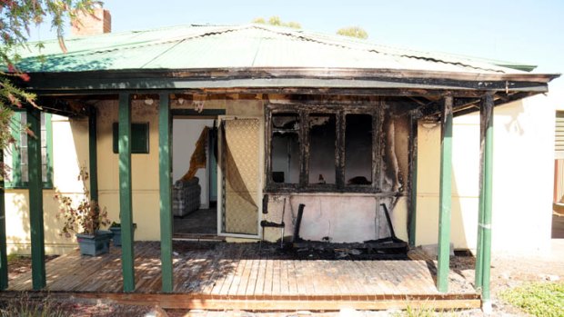A female resident at a Northam property woke up to find her house on fire.