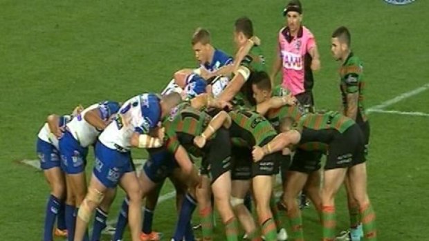 Sam Burgess pulls upright in the scrum to avoid contact with Browne.