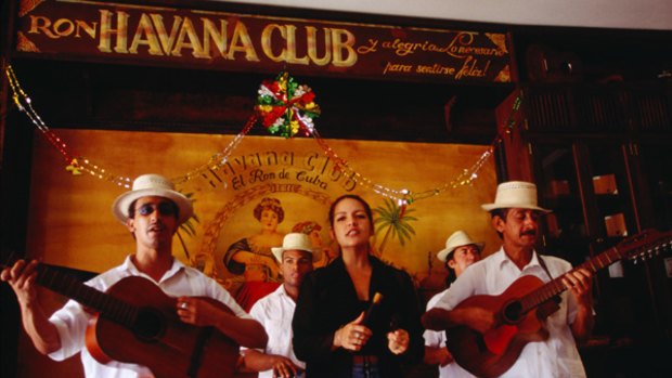Cuban collective ... musicians perform in the Bar Havana Club.