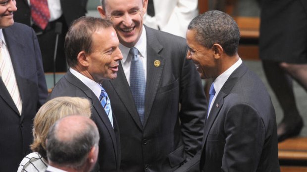 Opposition Leader Tony Abbott greets US President Barack Obama at Parliament House yesterday.