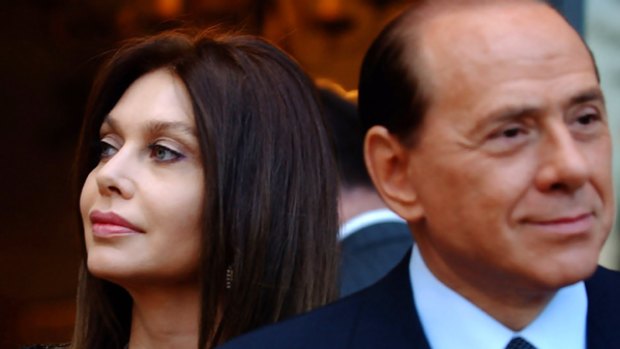 ``I and my children are victims,'' says Veronica Lario, pictured with Silvio Berlusconi.