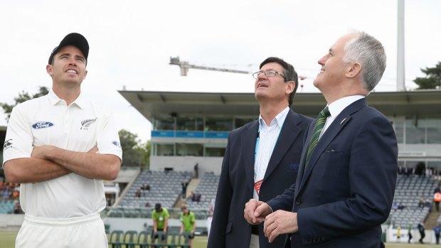 Prime Minister Malcolm Turnbull tosses the coin for the Prime Minister's XI match.