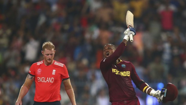 Send-off: Marlon Samuels celebrates after Carlos Brathwaite hit the second six of his four final-over slogs off the bowling of Ben Stokes.