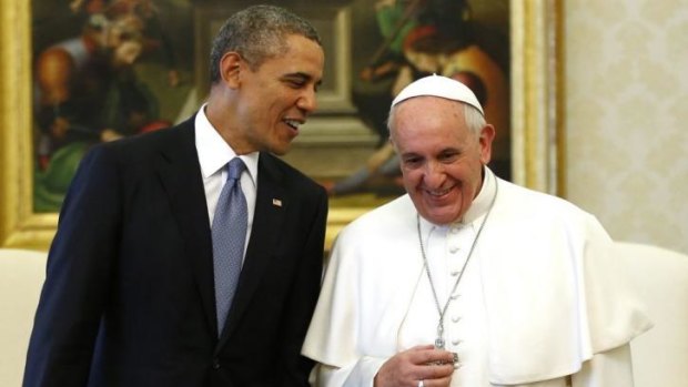 Warm meeting ... US President Barack Obama shares a joke with Pope Francis during their first meeting at the Vatican. 