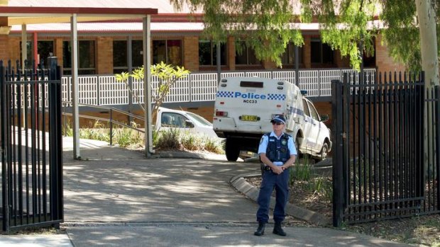 Evacuated ... police outside Hunter Christian School in Mayfield, Newcastle.