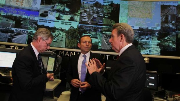 Prime Minister Tony Abbott visits the Traffic Management Centre at Everleigh with Premier Barry O'Farrell (right) and Phil Akers (left) to announce the new Westconnex project.