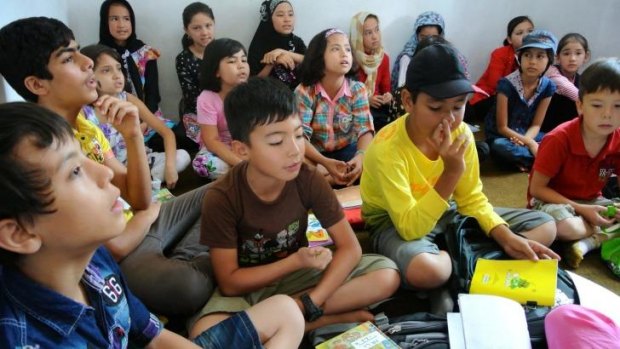 A class at the learning centre in Cisarua.