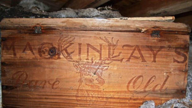 On ice ... A whisky crate is stored beneath the floor of a hut built by British explorer Sir Ernest Shackleton during his 1908 Antarctic expedition.
