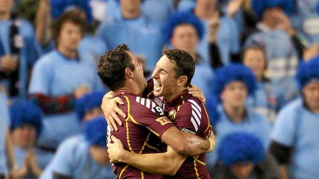 Cameron Smith and Billy Slater celebrate their victory in Origin I, which attracted record national viewer numbers.