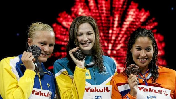 Campbell on the podium with silver medal winner Sarah Sjostrom of Sweden (L) and bronze medallist Ranomi Kromowidjojo of the Netherlands.