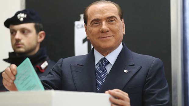 Former Premier Silvio Berlusconi cast his ballot in Milan, Italy.