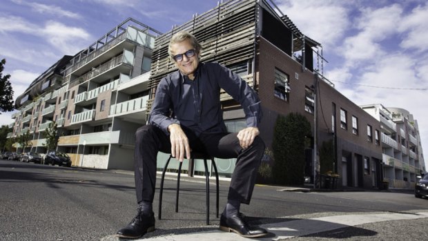 Architect Ivan Rijavec with the ‘Cheese Grater’ building he designed in Fitzroy.