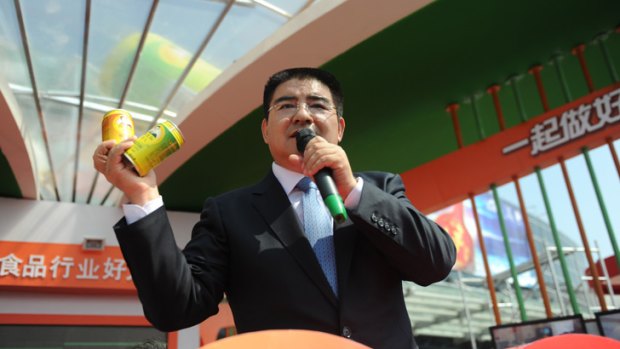 Ready to inhale ... Chinese billionaire Chen Guangbiao with his canned fresh air.