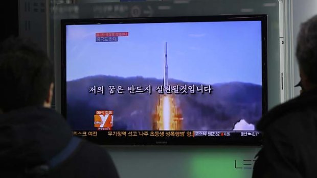 Propaganda ... the North Korean video is shown in a news report in Seoul, South Korea.