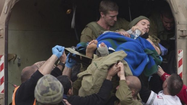 A wounded Israeli soldier is evacuated to a hospital from the occupied Golan Heights on March 18.