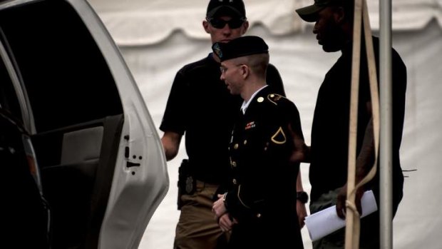 Guilty: Bradley Manning  is escorted out of court after the verdict.