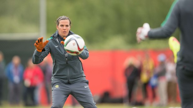 Tough assignment: Australian goalkeeper Lydia Williams makes a stop during a team training session in Canada. 