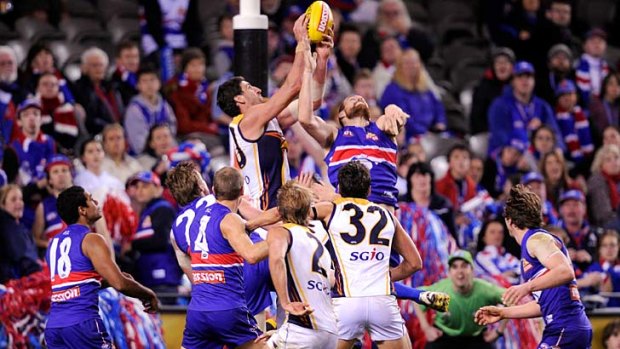 Pack power: Dean Cox takes his last-minute, match-winning grab.