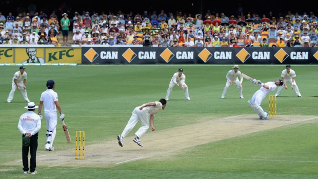 Steaming in... Mitchell Johnson had England's batsmen on the back foot with his aggression and pace at the Gabba.