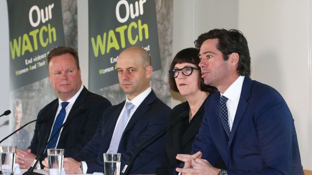 AFL chief executive Gillon McLachlan (far right) at an 'Our Watch' event.