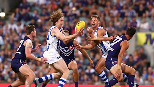 North Melbourne's Ben Brown suffered a knee injury in the thriller against the Dockers. 