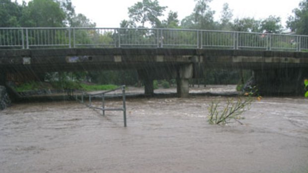 Water on the rise at Ithaca Creek in Red Hill Photo: Scott Casey 