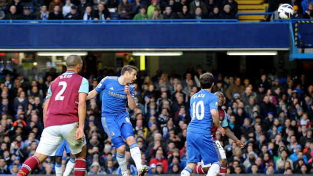 Frank Lampard heads in his 200th goal for Chelsea.