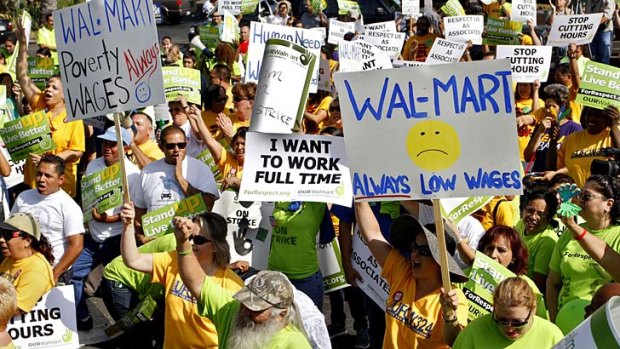 Free to proceed with demonstrations ... striking Wal-Mart workers protest unsafe working conditions and poor wages in October.
