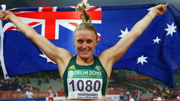 Sally Pearson celebrates after winning the 100m.