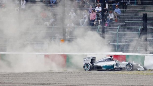 Hamilton lost control and crashed into a tyre barrier on turn one, tearing off his front left wheel.