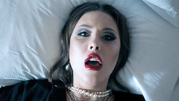 Chloe Lattanzi in a scene from the <I>Play With Me</i> music video, which features graphic violence, suicidal images and drug use.