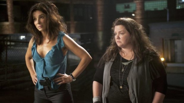 Paul Feig and Katie Dippold collaborated on <i>The Heat</i>, starring Sandra Bullock and Melissa McCarthy. 