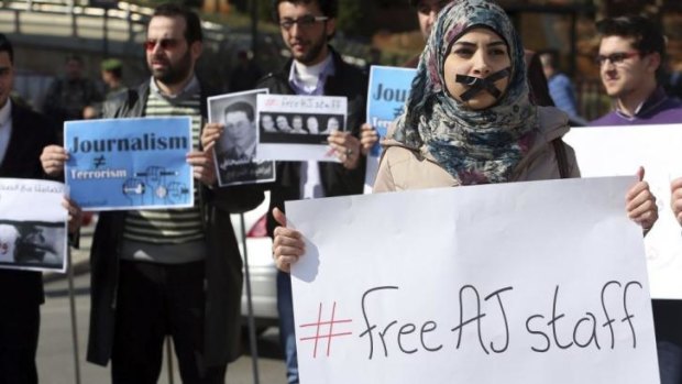 International campaign: Protesters against the detention of the al-Jazeera journalists in Beirut.