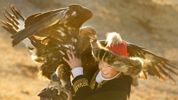 Aisholpan and her eagle.