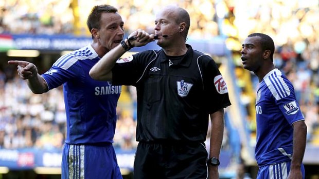 Gang of two ... Chelsea's John Terry, left, and Ashley Cole assail referee Lee Mason during a match against West Bromwich Albion earlier this year. The pair's antics detract from their team's achievements this season.