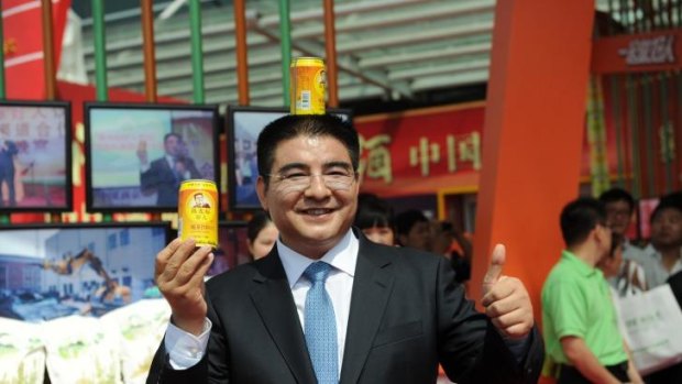 Chinese billionaire Chen Guangbiao, pictured here with his canned fresh air, wants to buy the New York Times.