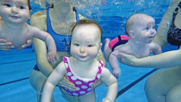 Water babies: Katie, Anabelle and Lorelai in the Baby Swim class at Ringwood.