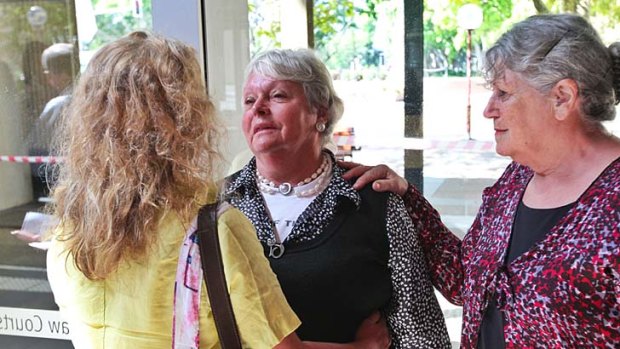 ''I used to be loved beautifully'' &#8230; Carolyn DeWaegeneire is comforted after this week's hearing.
