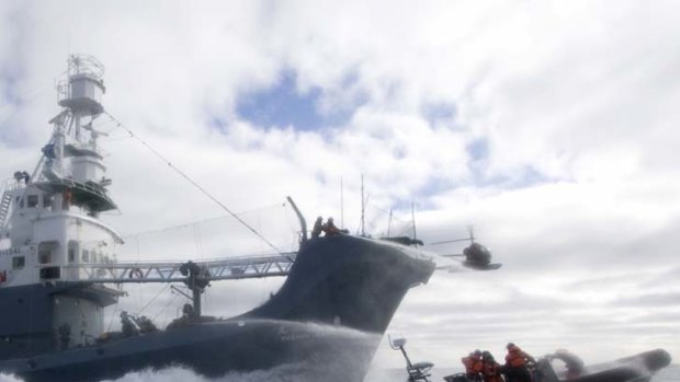 Hard-fought ... a Sea Shepherd crew is hosed down.