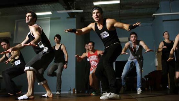 Sam Ludeman (centre) auditions for Rock of Ages.