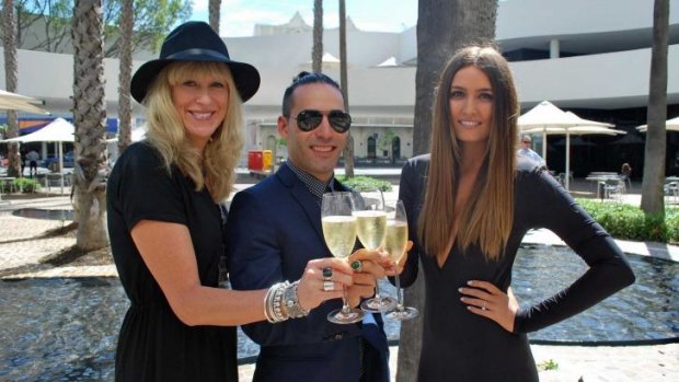 Natasha Hinett, Andy Otto and Mia Theodoropoulos enjoy a glass of bubbly.